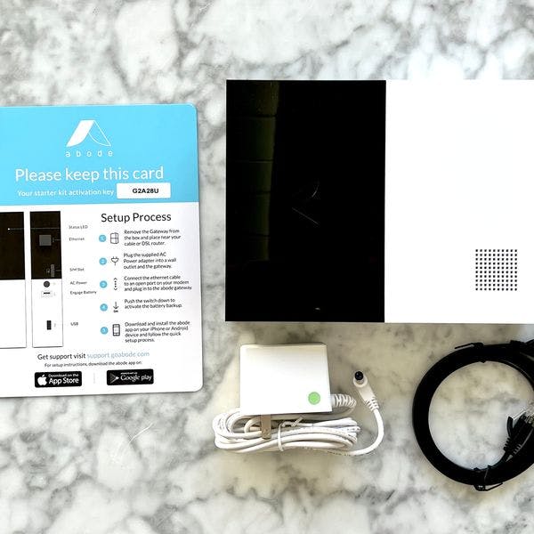 Abode home security base station, power plug, and installation guide