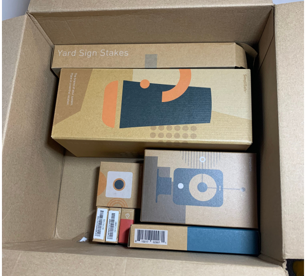 Unopened SimpliSafe devices in box