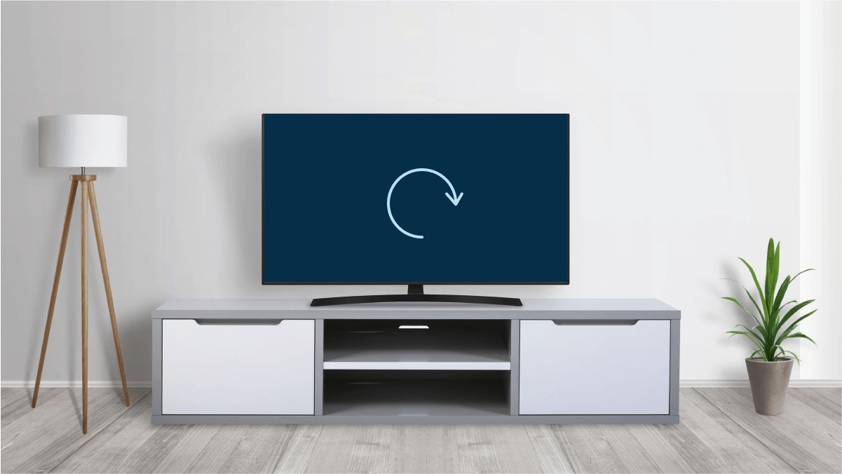 Photo of TV displaying a "restarting" symbol
