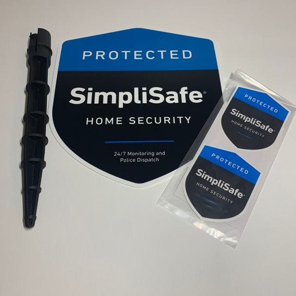 SimpliSafe yard sign and stickers