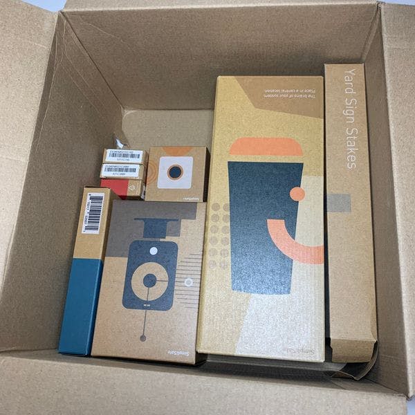 Collection of sealed SimpliSafe devices