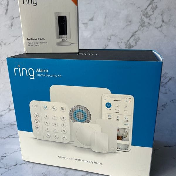 Boxed Ring alarm system and indoor camera